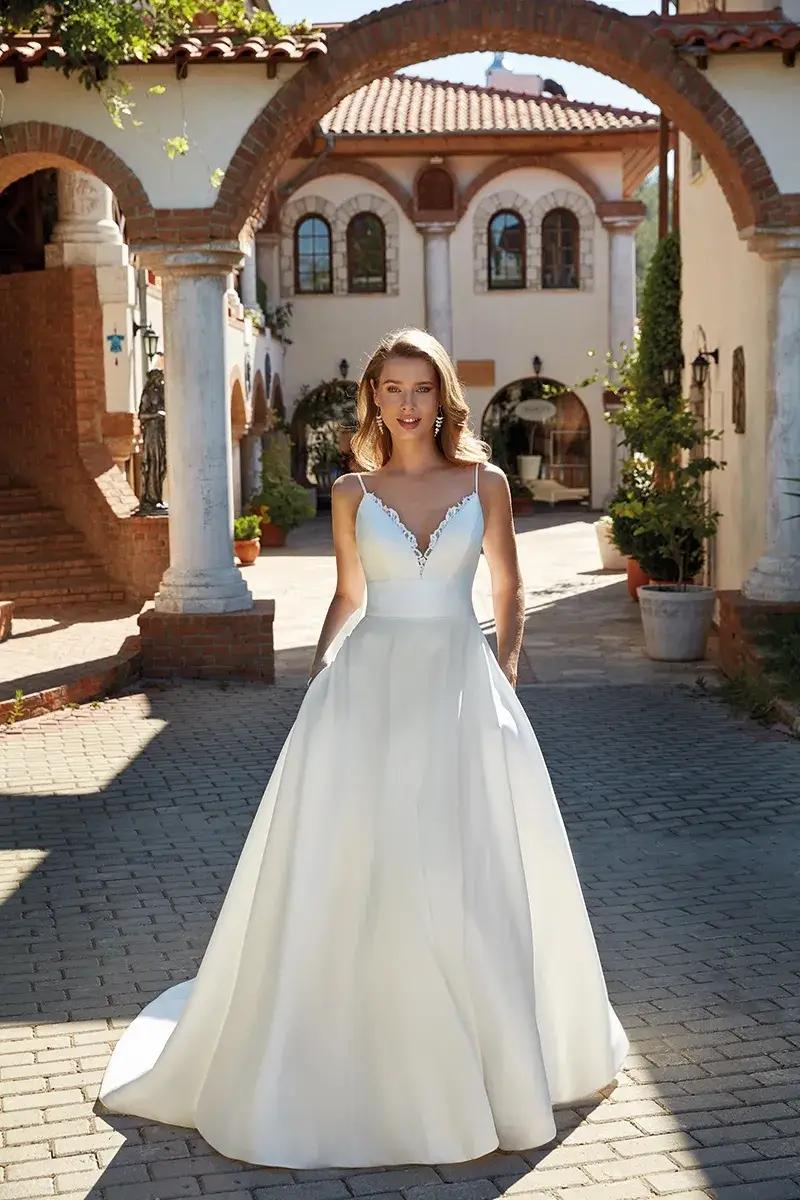 Enchanting Elegance: Unveiling the Timeless Beauty of Eddy K Wedding Gowns Image