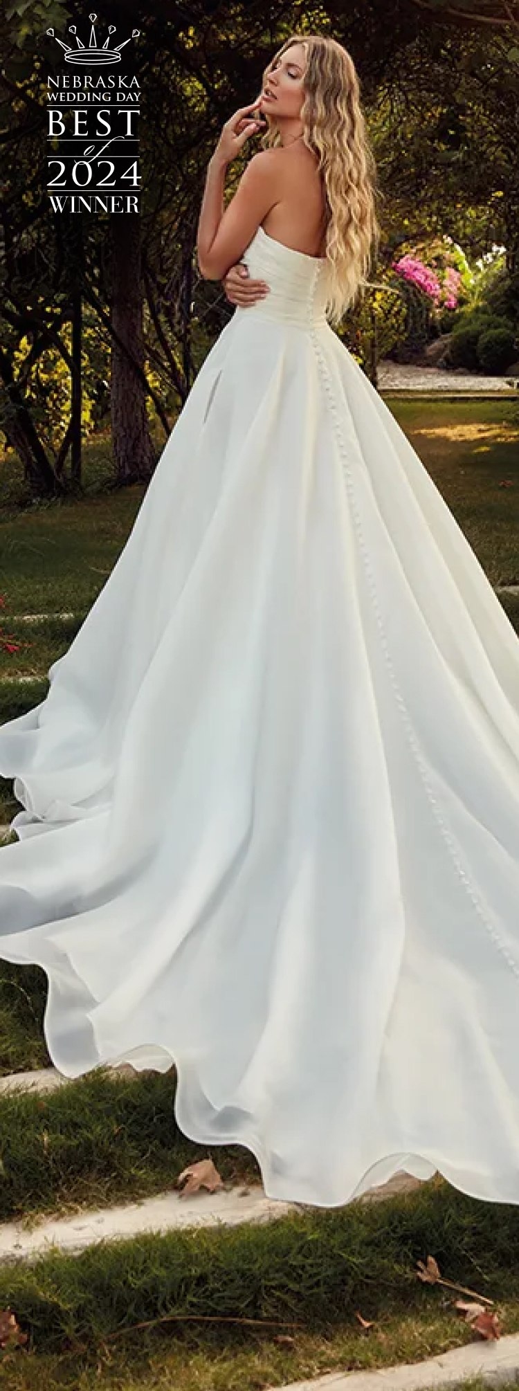 Model wearing a white gown
